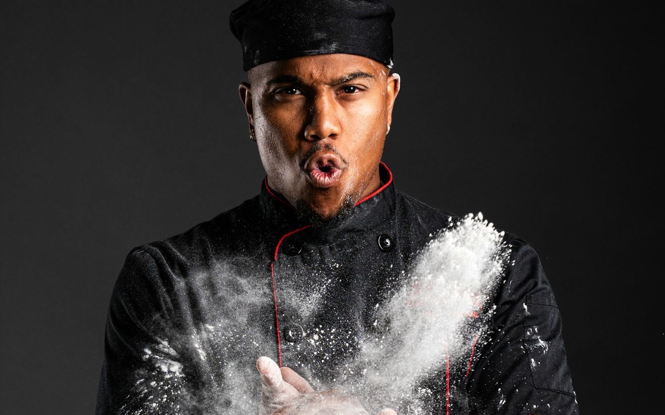 Hospitality worker in dirty stained clothes